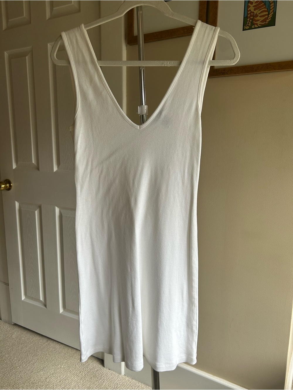 Moda International White Sleeveless V-Neck Knit Top
